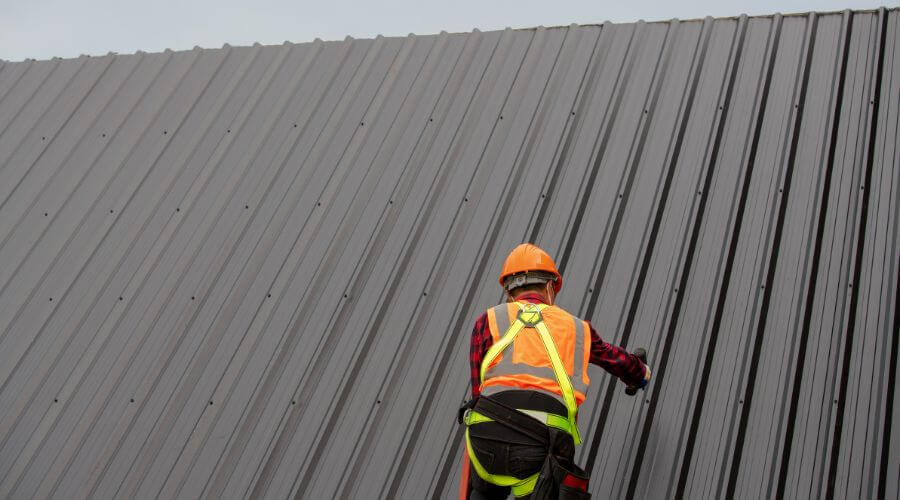 Professional metal roof installation services in Alpena, SD